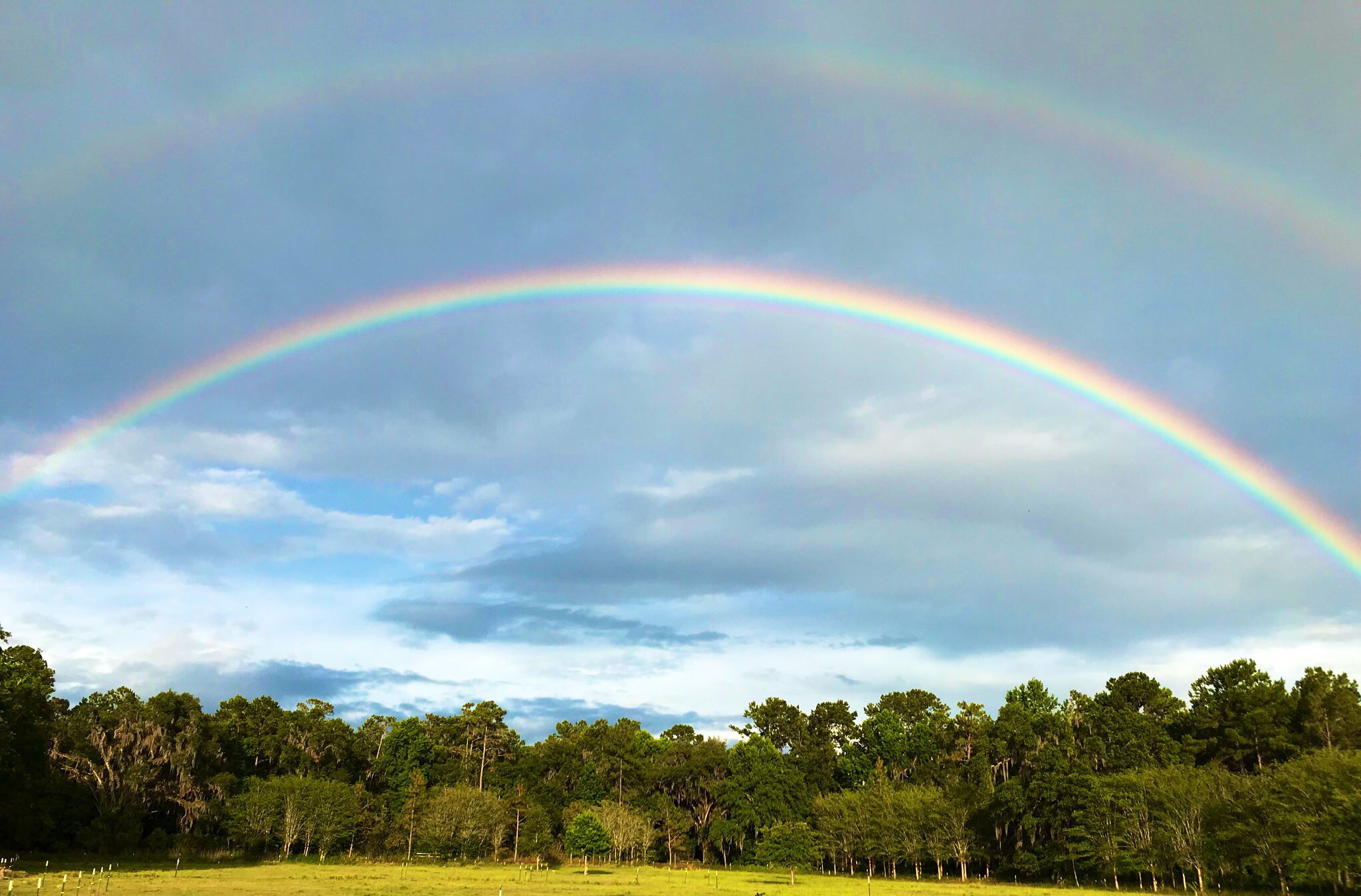 A full rainbow over the fields at Irish Acres